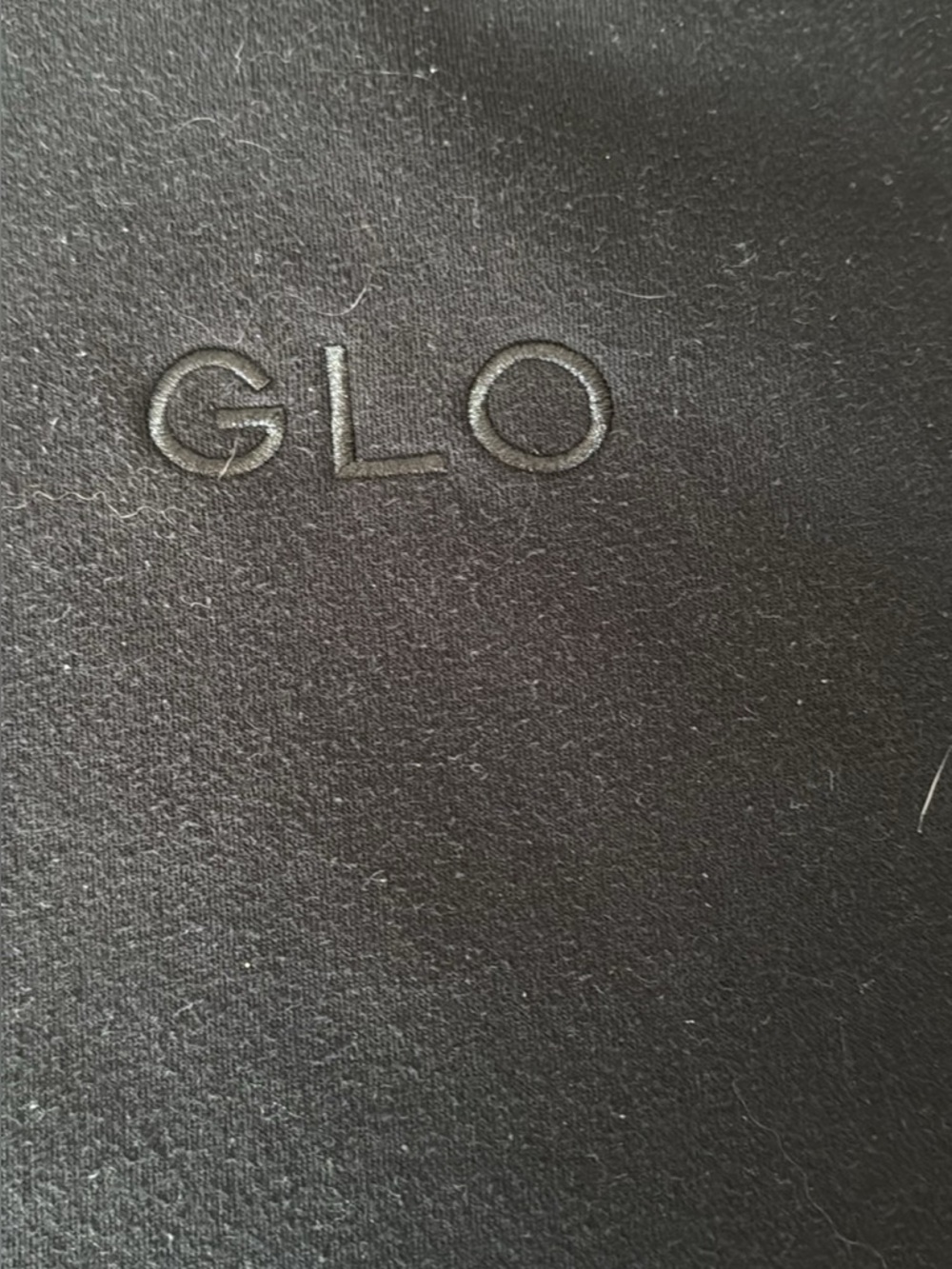 GLO Black Embossed hoodie. Size small. Oversized